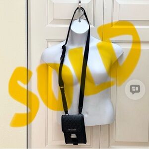 SOLD. Authentic Michael Kors signature monogram phone crossbody bag